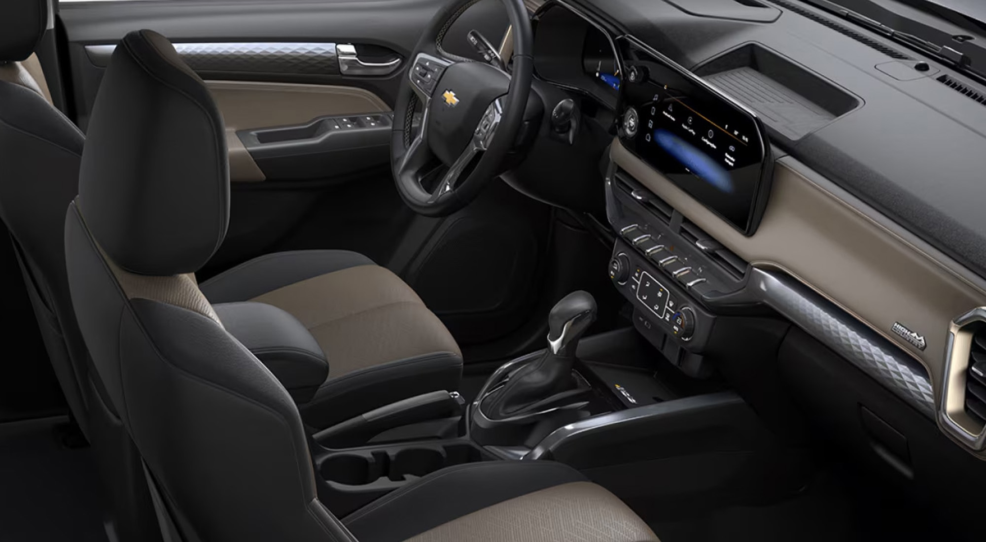 Interior con asientos, pantalla táctil y volante de la Chevrolet S10